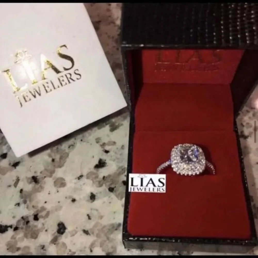 New 18k white gold engagement ring